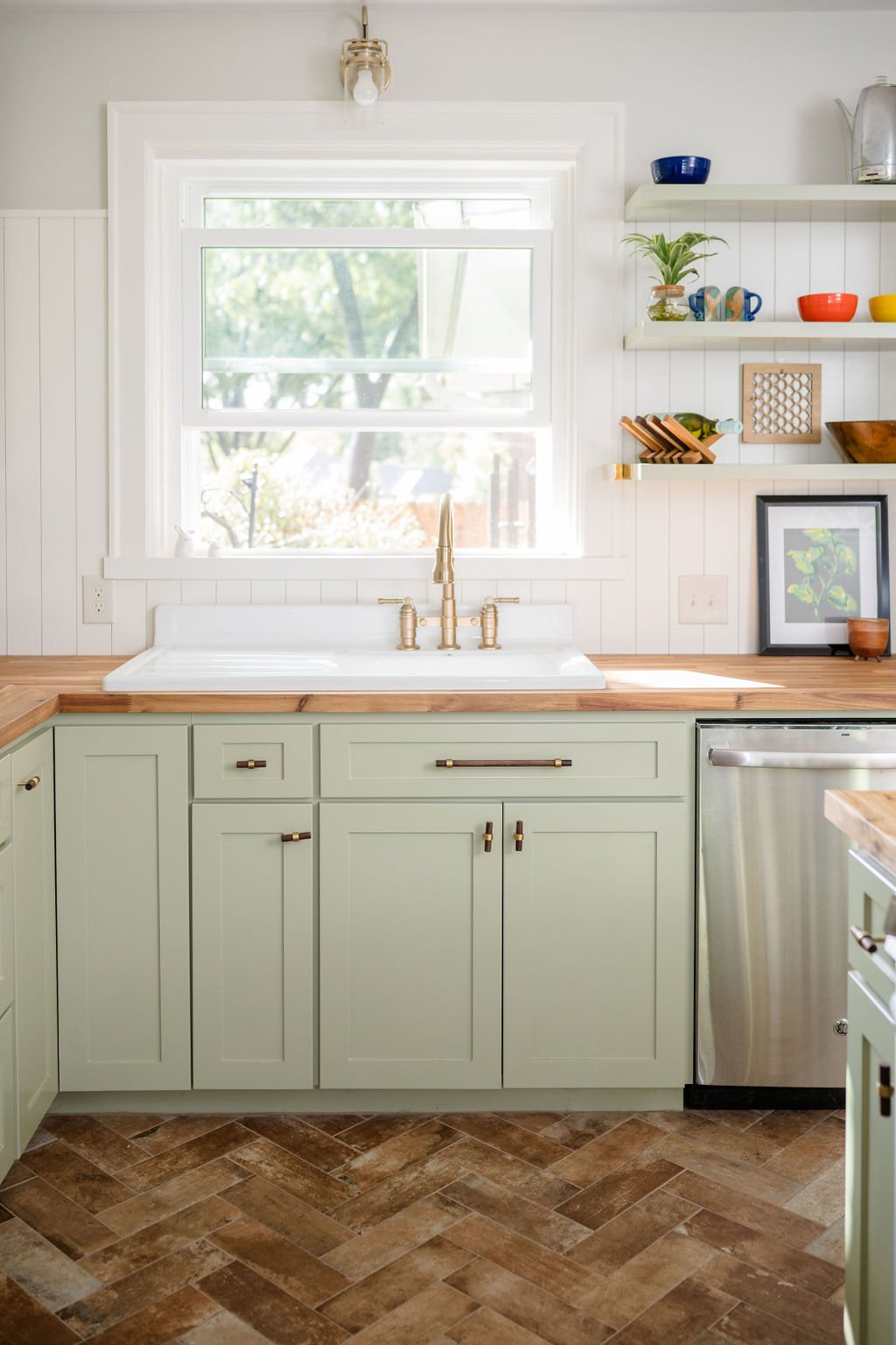 Wichita Falls Kitchen with Light Green Cabinets and Herringbone Patterned Flooring