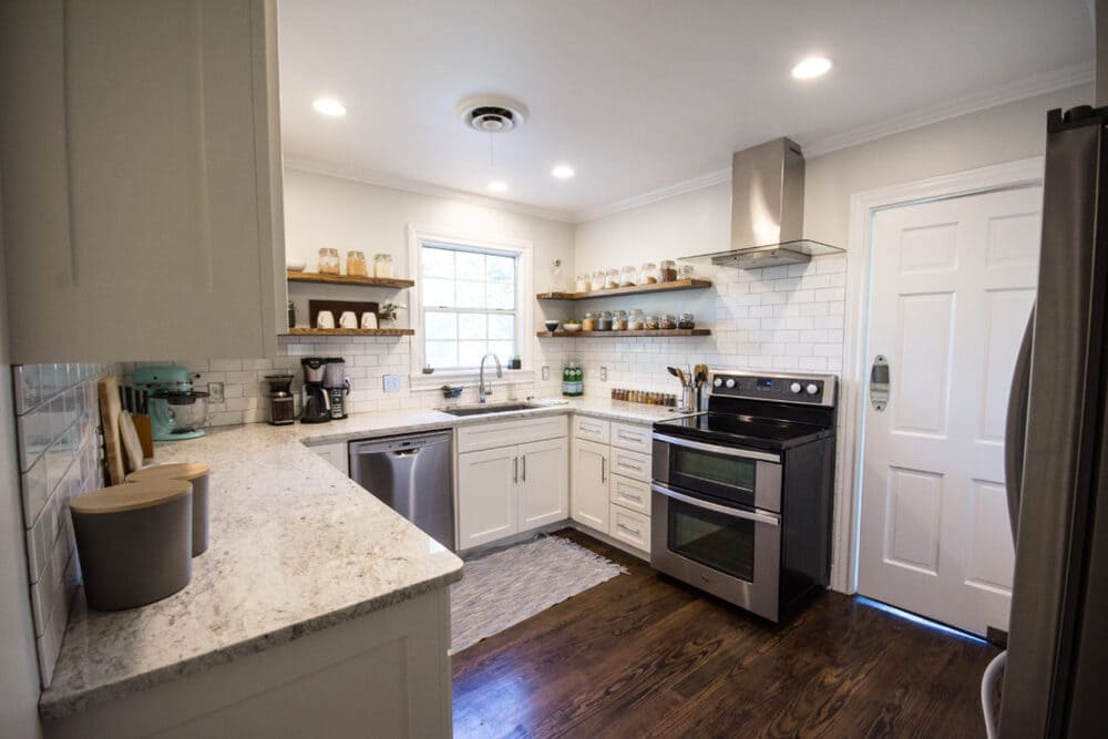 White Kitchen with Stainless Steel Washer and Oven
