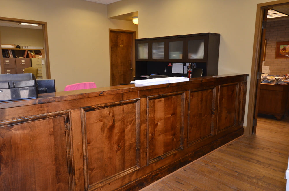 Counter in Office Building Made of Dark Wood
