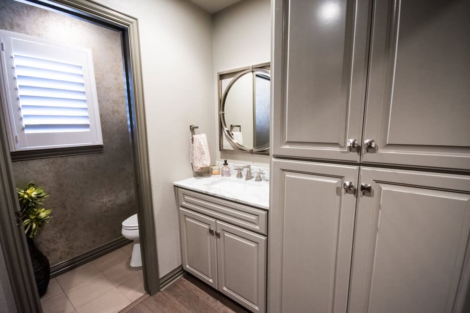 Bathroom with Single Sink and Multiple Cabinets for Storage