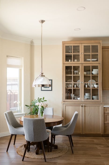Transitional Kitchen with Brown Floor and Storage with Modern Grey Armless Chairs