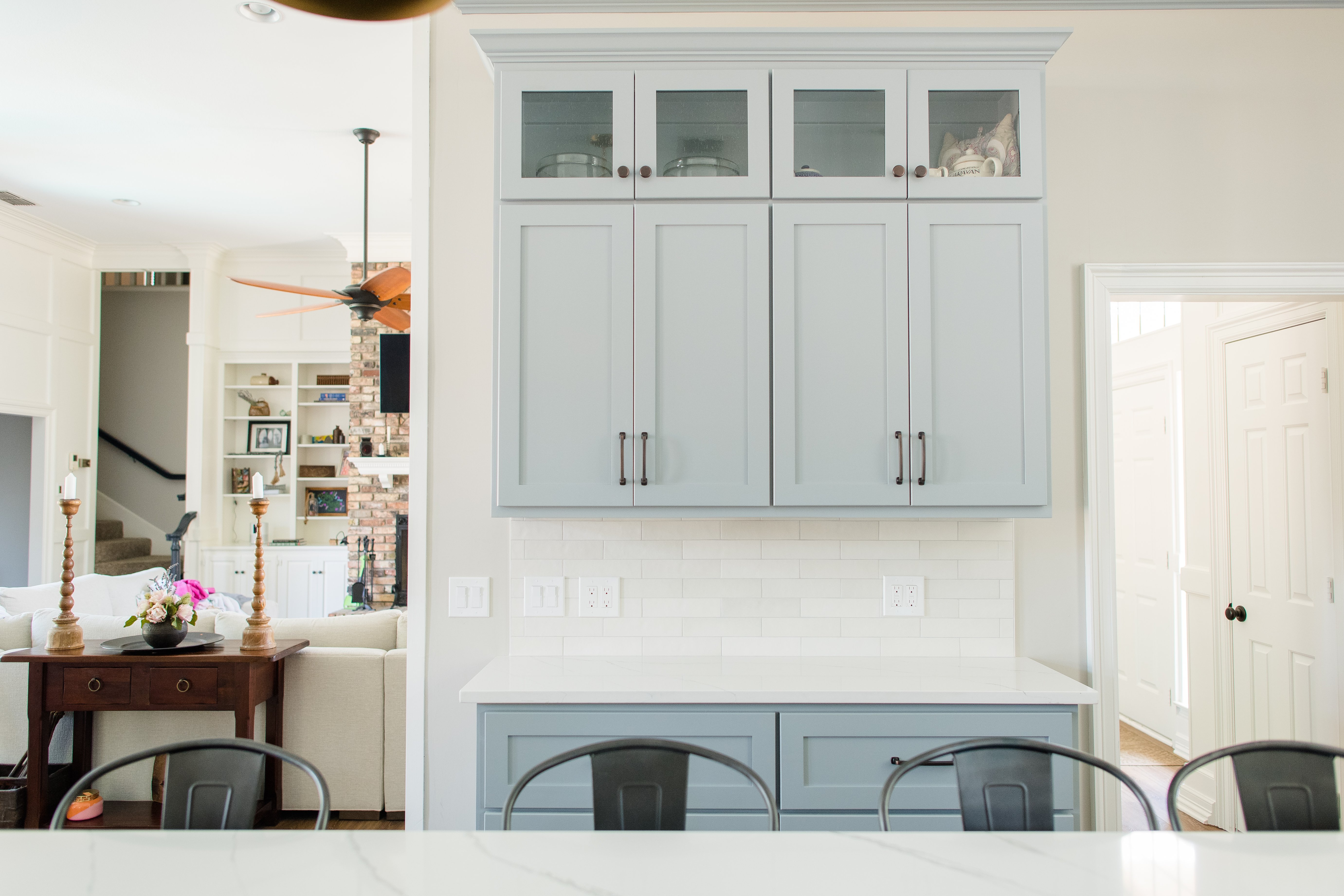 Light Blue Storage Cabinets with White Backsplash