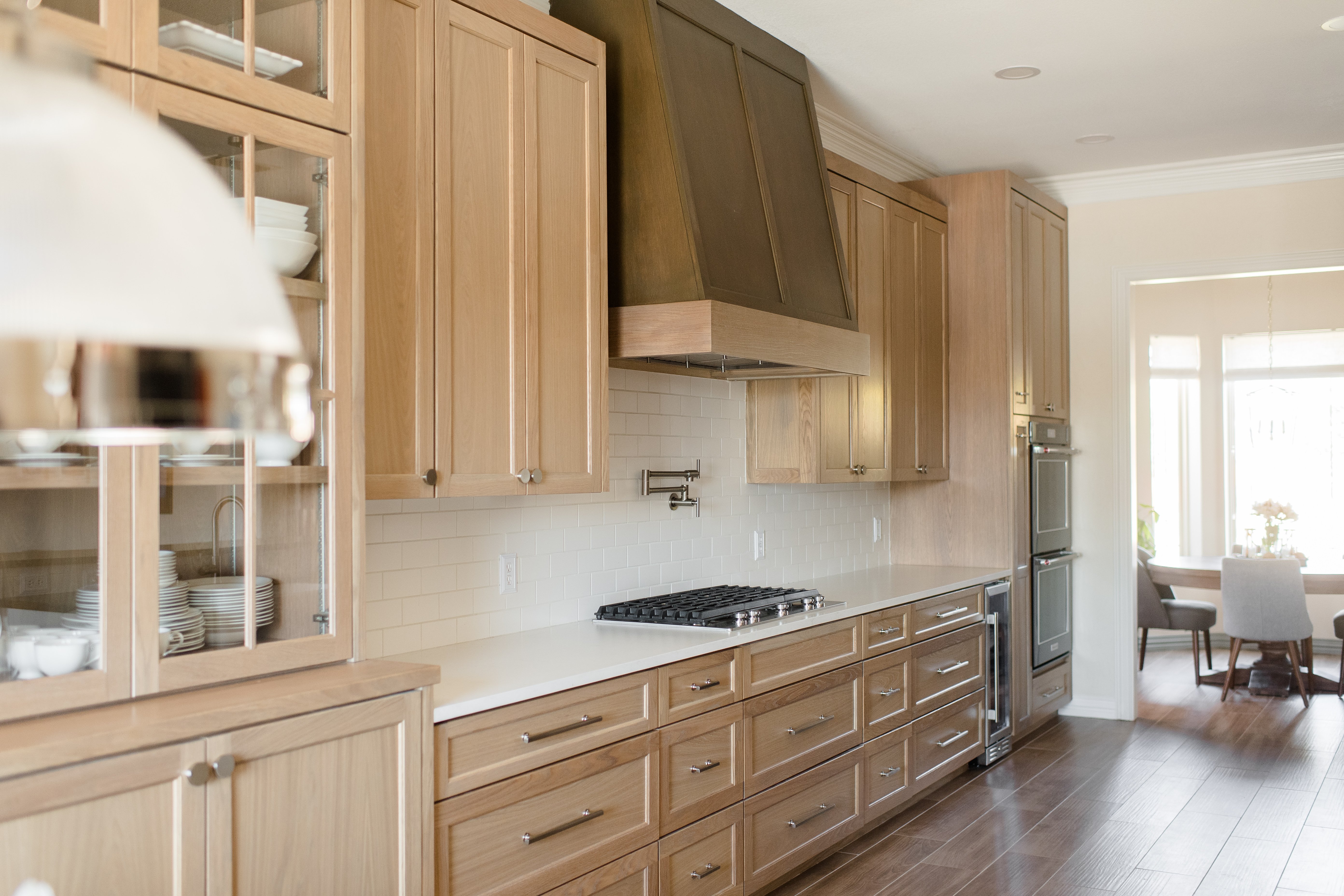 Natural Kitchen Cabinets with Custom Wood Range Hood