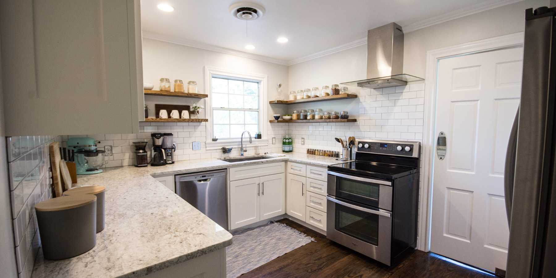 Brook Village Kitchen with White Countertop and White Subway Tile Backsplash